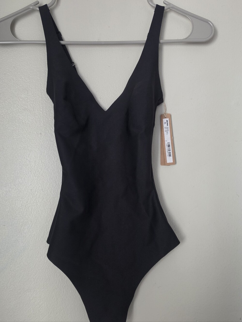 Skim's body plunge body suit XXS